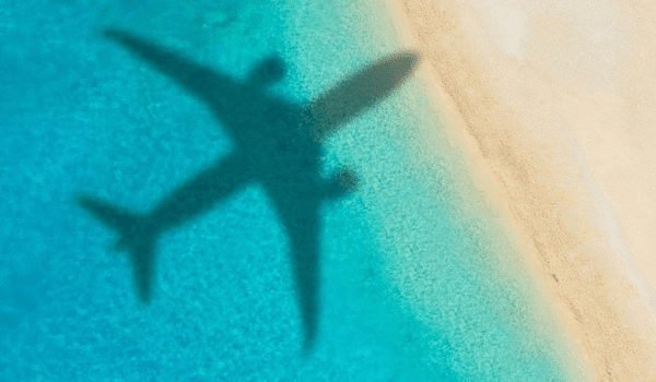 plane shadow in crystal clear water