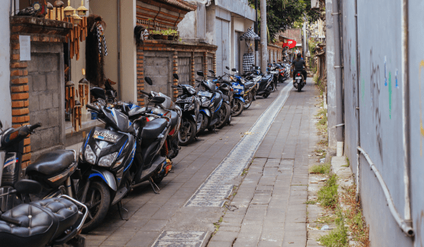 Ubud street lined with scooters